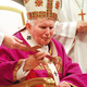 Above: The aging Pope John Paul II, who observers say has been "consecrating random objects like there's no tomorrow."